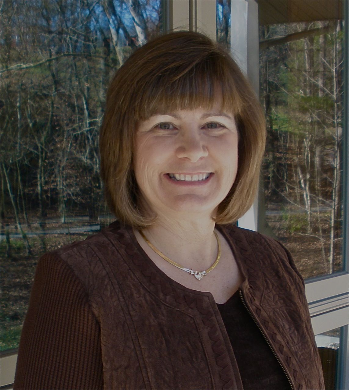 Brussels Sprout Slaw with Glazed Pecans In A Mustard Dressing
